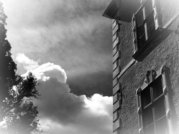 A split image showing a house undamaged on one side, and damaged by a storm on the other side, illustrating the protection offered by homeowners insurance.