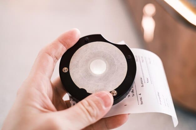 A close-up of an electricity bill with various charges highlighted, next to a hand holding a magnifying glass, symbolizing the detailed examination of energy costs for potential HEAP assistance.