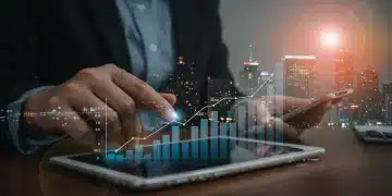 Person reviewing debt consolidation plan on tablet, showing financial progress